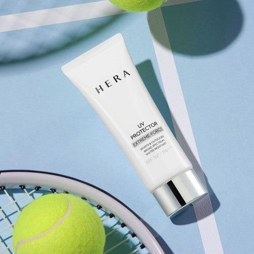 HERA UV Protector Extreme-Force Leports SPF50+PA++++ with tennis gear on blue background