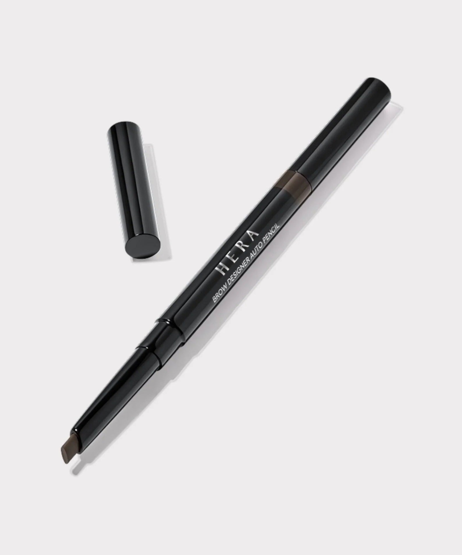 HERA Brow Desighner Auto Pencil for precise brow styling and definition. Elegant black design with retractable feature.