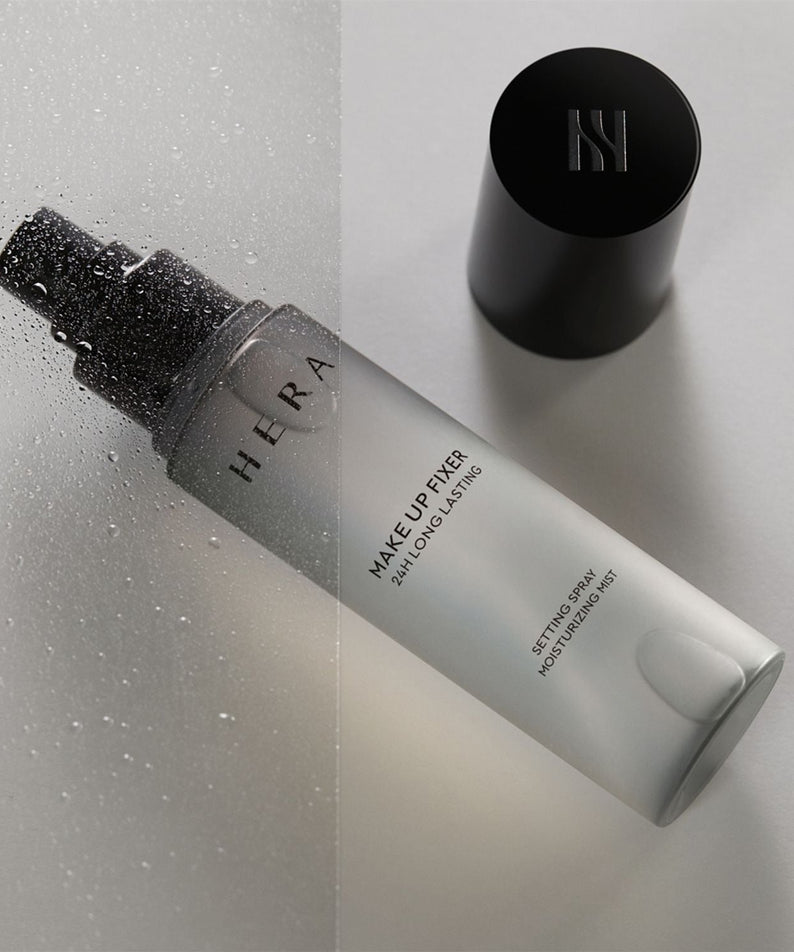 HERA Make Up Fixer 80ml in sleek black and white bottle with cap