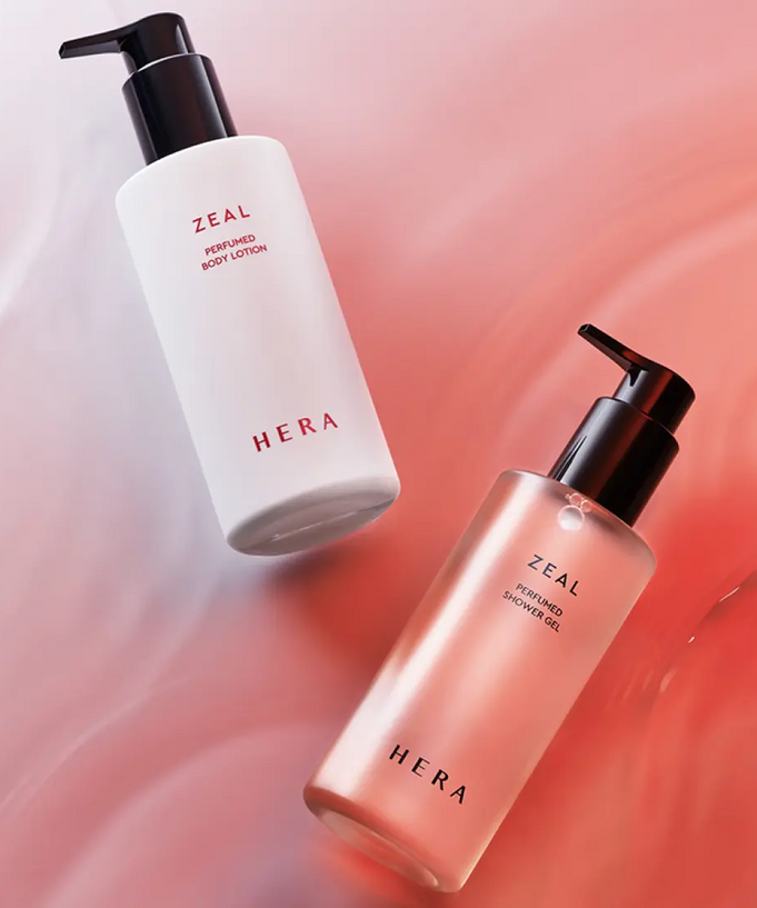 HERA Zeal Blooming Perfumed Shower Gel 250g and Lotion on pink background
