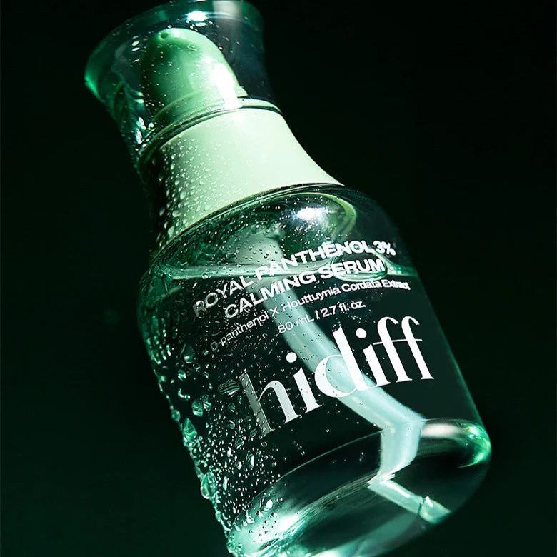 HIDIFF Royal Panthenol 3% Calming Serum bottle with water droplets against dark backdrop