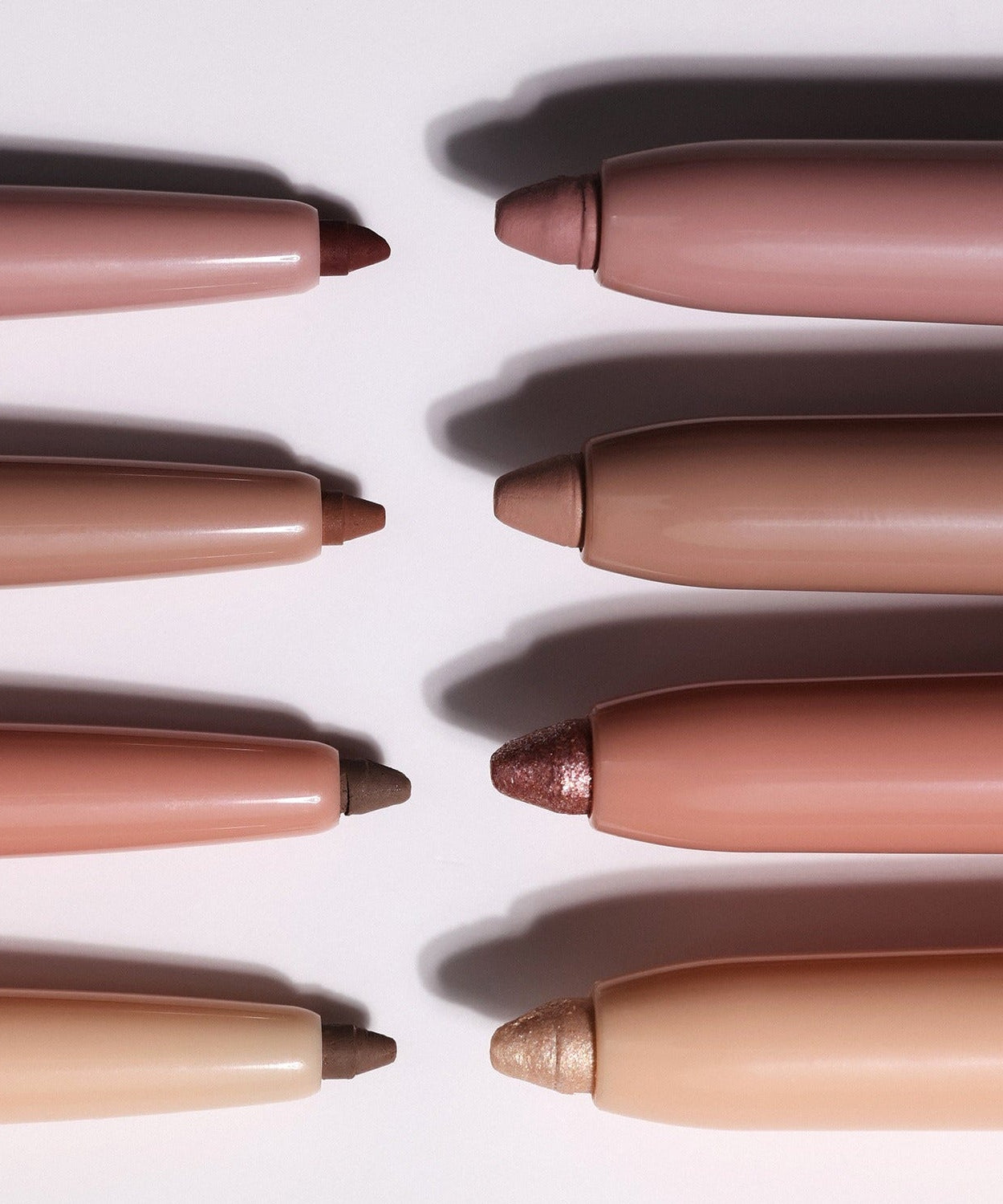 HINCE Depth Dual Color Stick makeup products in various shades, showcasing versatile color options for eyes and cheeks.