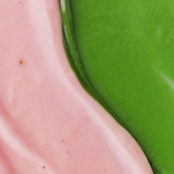 Close-up view of HIT THE TEA Super Matcha Strawberry Rool Cake Gluten-Free, showcasing pink and green layers.