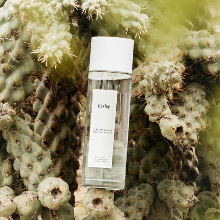 Image of HUXLEY Toner Extract it 120ml bottle with cactus background, highlighting the HUXLEY Toner Extract it 120ml product.
