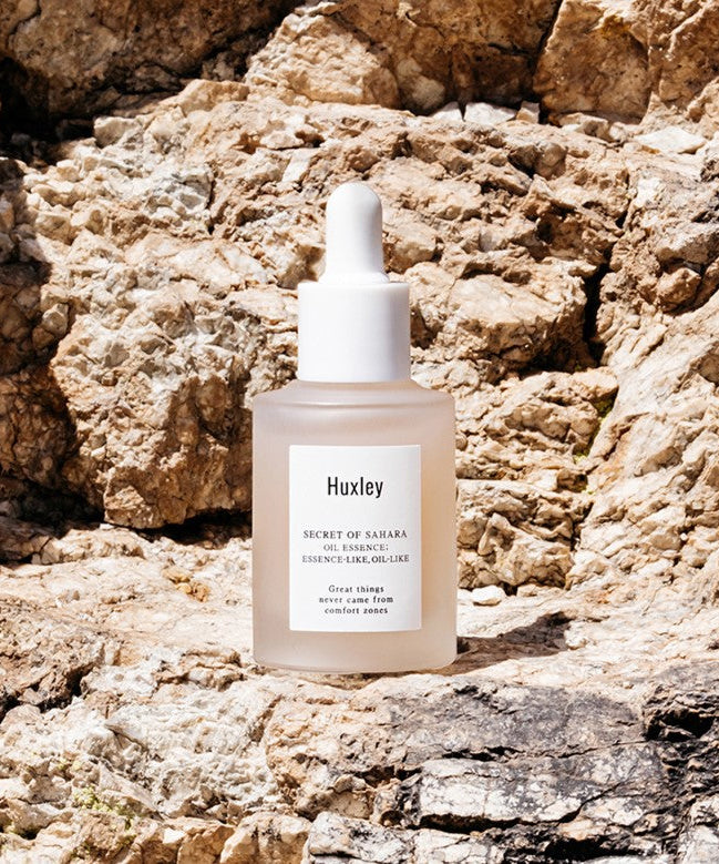 HUXLEY Oil Essence Like Oil Like 30ml bottle on rocky backdrop
