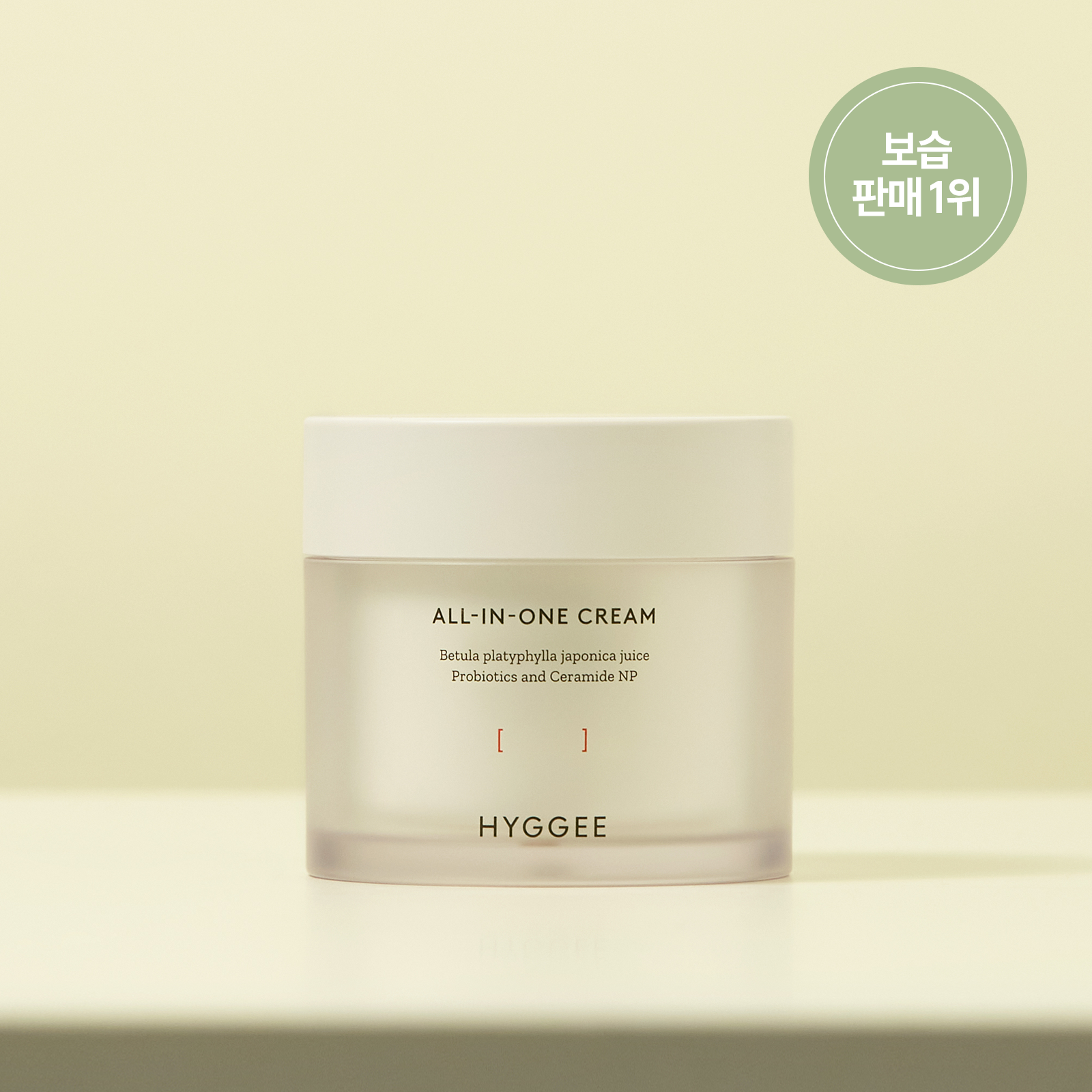 HYGGEE All-In-One Cream 80g jar on a light background, showcasing skincare product with natural ingredients.