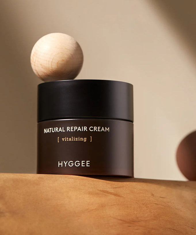 HYGGEE Nature Repair Cream 50ml in elegant packaging on a wooden surface