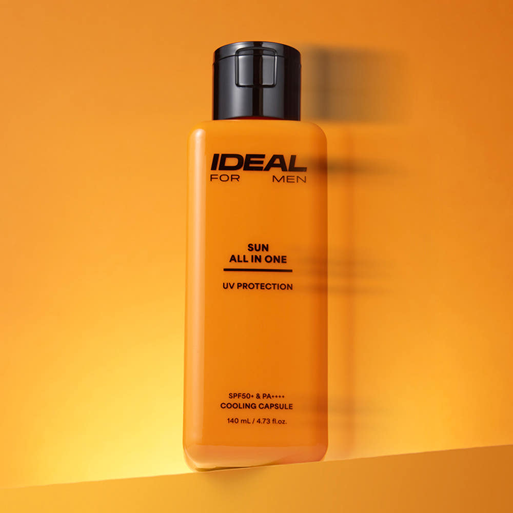 IDEAL FOR MEN Sun All-in-One 140ml sunscreen bottle on orange background by Gentleman Korea, men's skincare UV protection