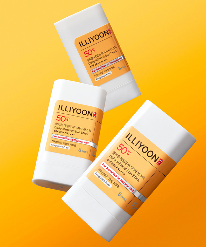 Three ILLIYOON Daily Weaponless Sun Stick 20g on an orange background.