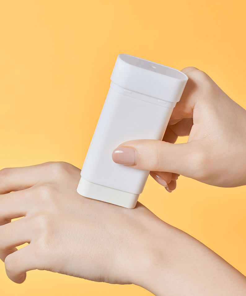 Applying ILLIYOON Daily Weaponless Sun Stick 20g on hand with a smooth glide for effective sun protection.