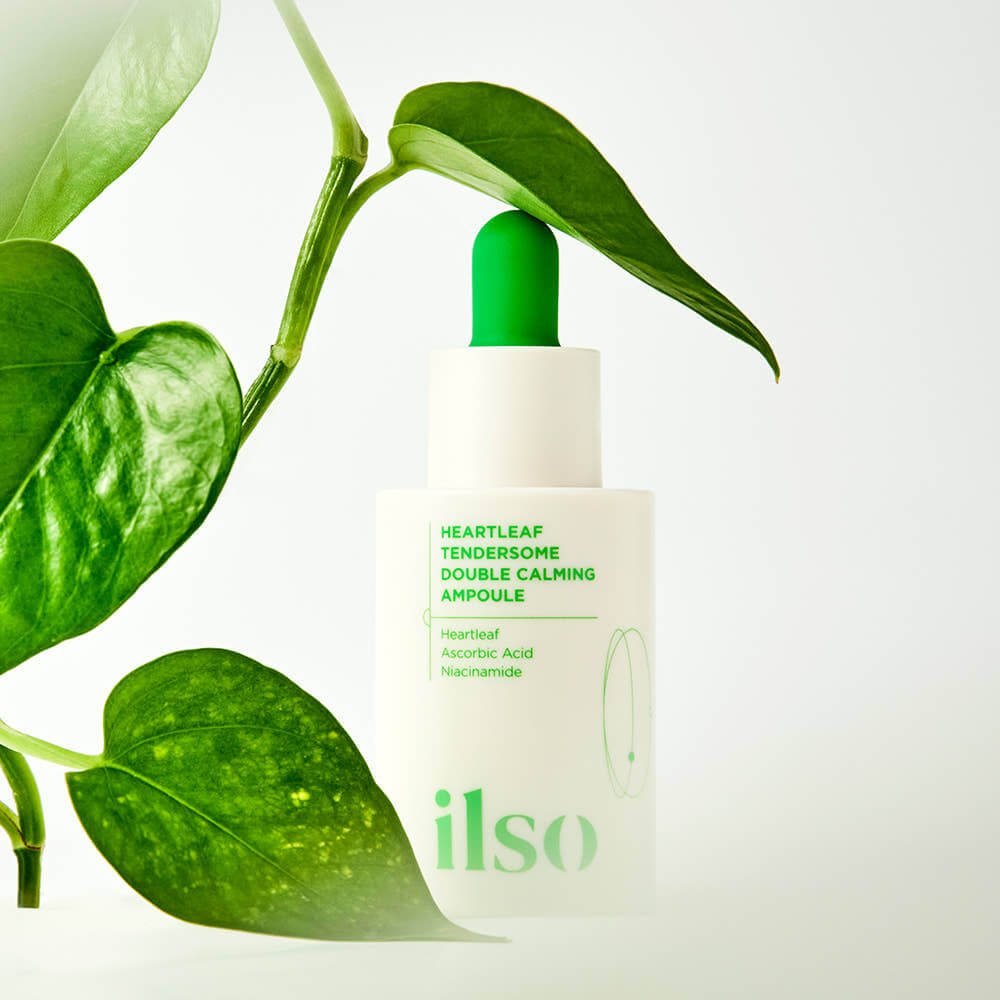ILSO Eoseongcho Tenderjom Double Calming Ampoule 30ml bottle with green leaves, promoting calming skincare benefits.