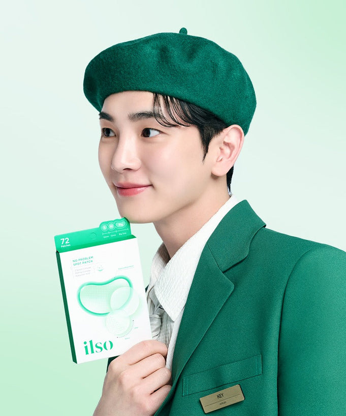 Person holding ILSO No Trouble Spot Patch product in a green package, highlighting skincare solution.