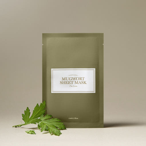 I'M FROM Mugwort Sheet Mask in beige packaging with fresh mugwort leaves, highlighting the natural ingredients and skincare benefits.