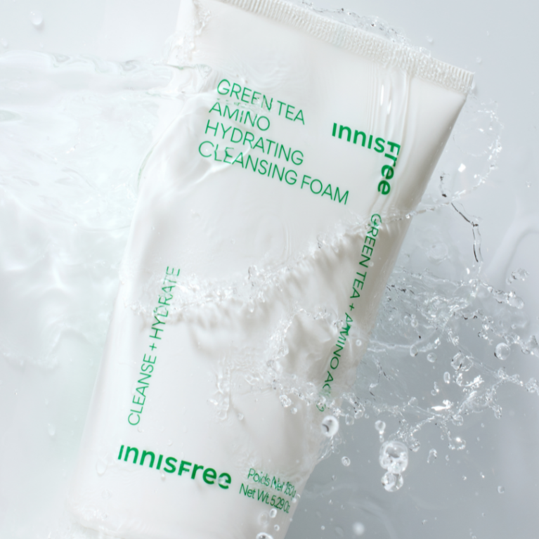 INNISFREE Green Tea Amino Hydrating Cleansing Foam 150ml tube submerged in water, showcasing its refreshing and hydrating properties.