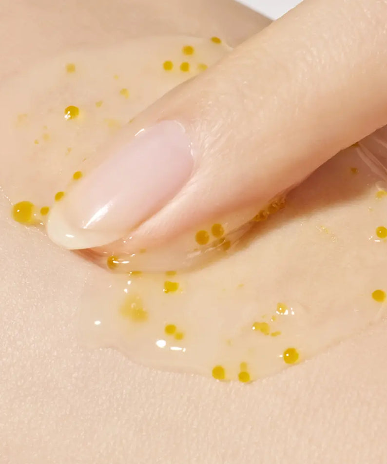 Application of INNISFREE Vitamin C Enzyme Brightening Cream 50ml on skin with visible texture and enhanced absorption.