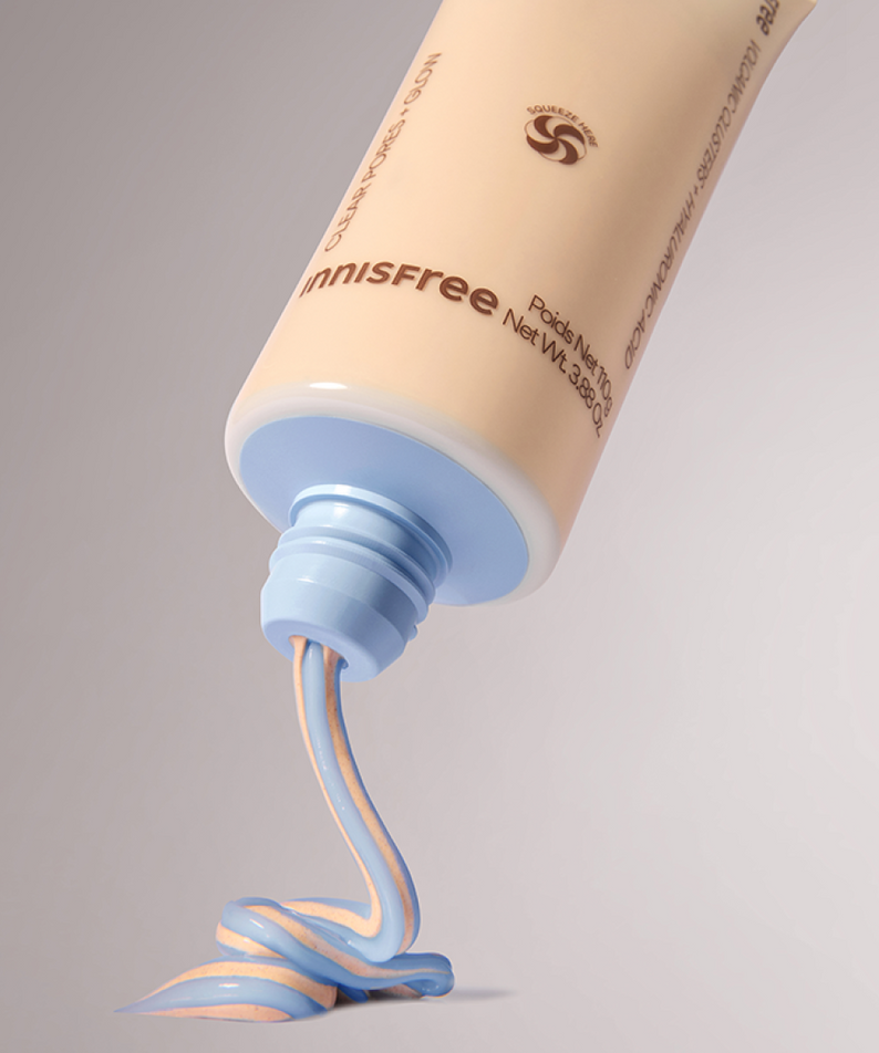 INNISFREE Volcanic Pore Dual Mask 110ml being dispensed from tube showcasing product texture.