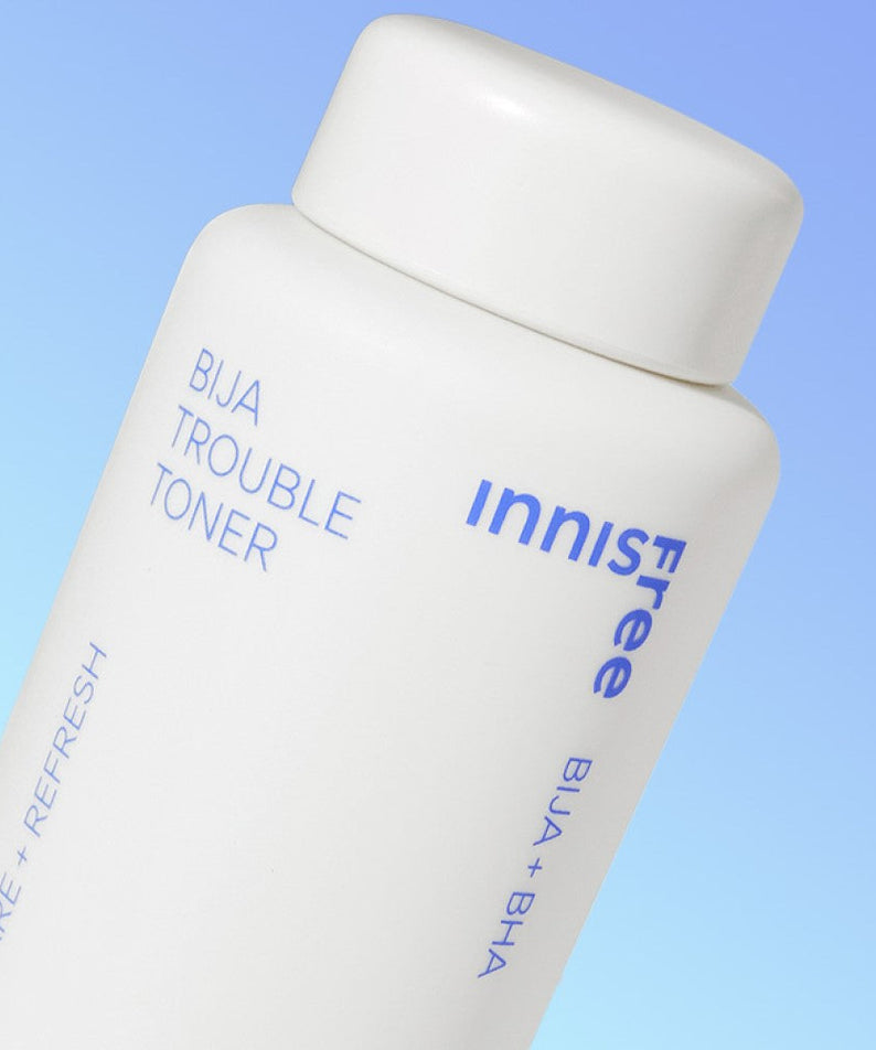 Close-up image of INNISFREE Bija Trouble Toner 170ml bottle with blue background.