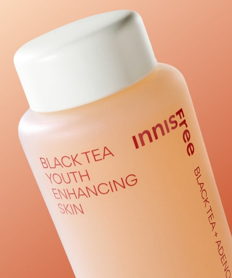 Bottle of INNISFREE Black Tea Youth Enhancing Skin 170ml with label showing product name and design.