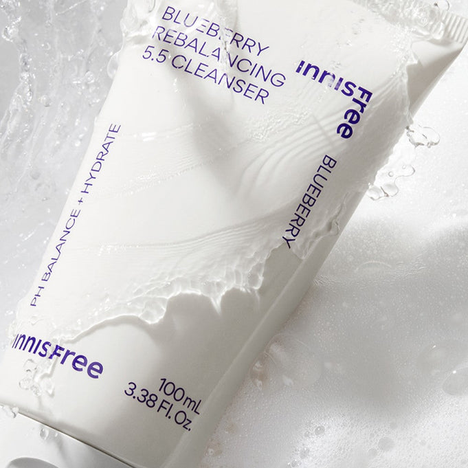 INNISFREE Blueberry Rebalancing 5.5 Cleanser product image with water droplets showcasing packaging design.