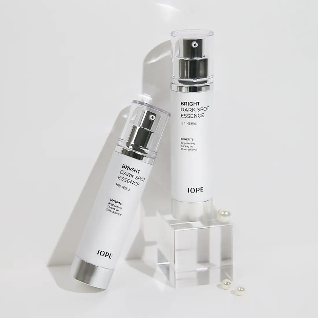 IOPE Brightening Spot Essence 45ml bottles displayed against a white background