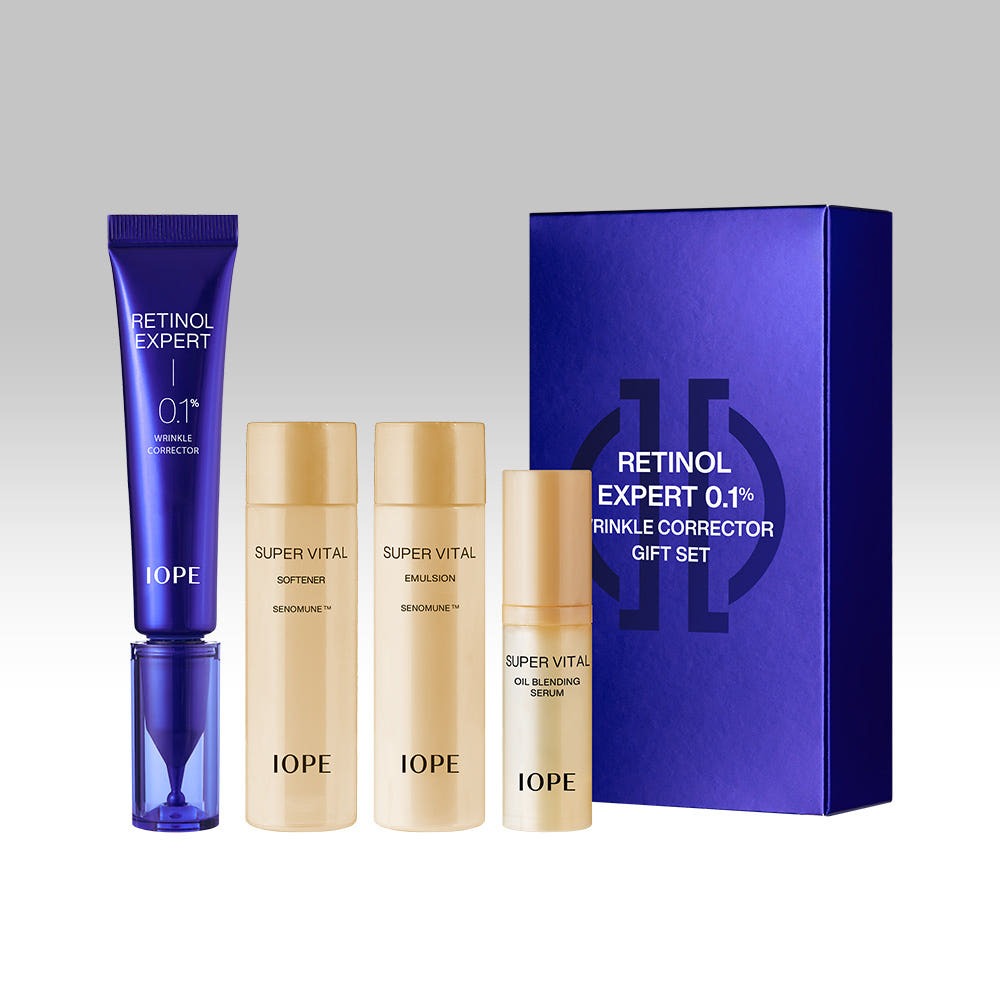 IOPE Retinol Expert 0.1% Wrinkle Corrector 30ml Set with packaging and additional skincare bottles.