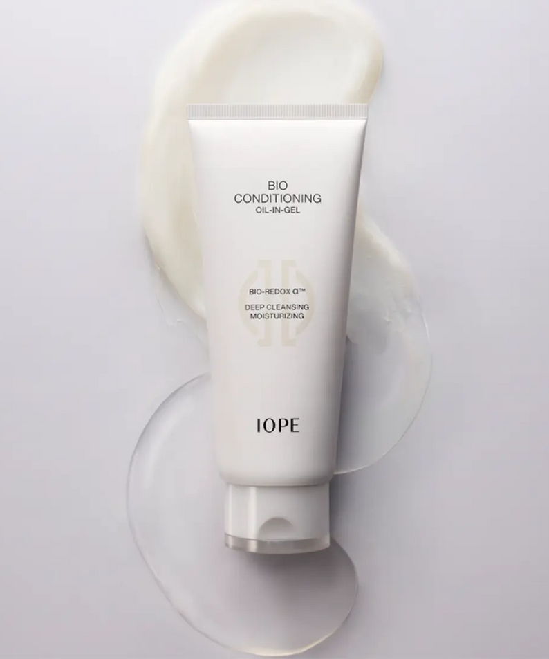IOPE Bio Conditioning Cleansing Oil-in-Gel 150ml tube on a creamy background, showcasing deep-cleansing and moisturizing properties.
