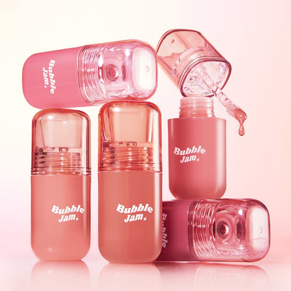 IPKN Bubble Jam Gloss bottles in pink, showcasing vibrant lip gloss colors for a glossy finish.