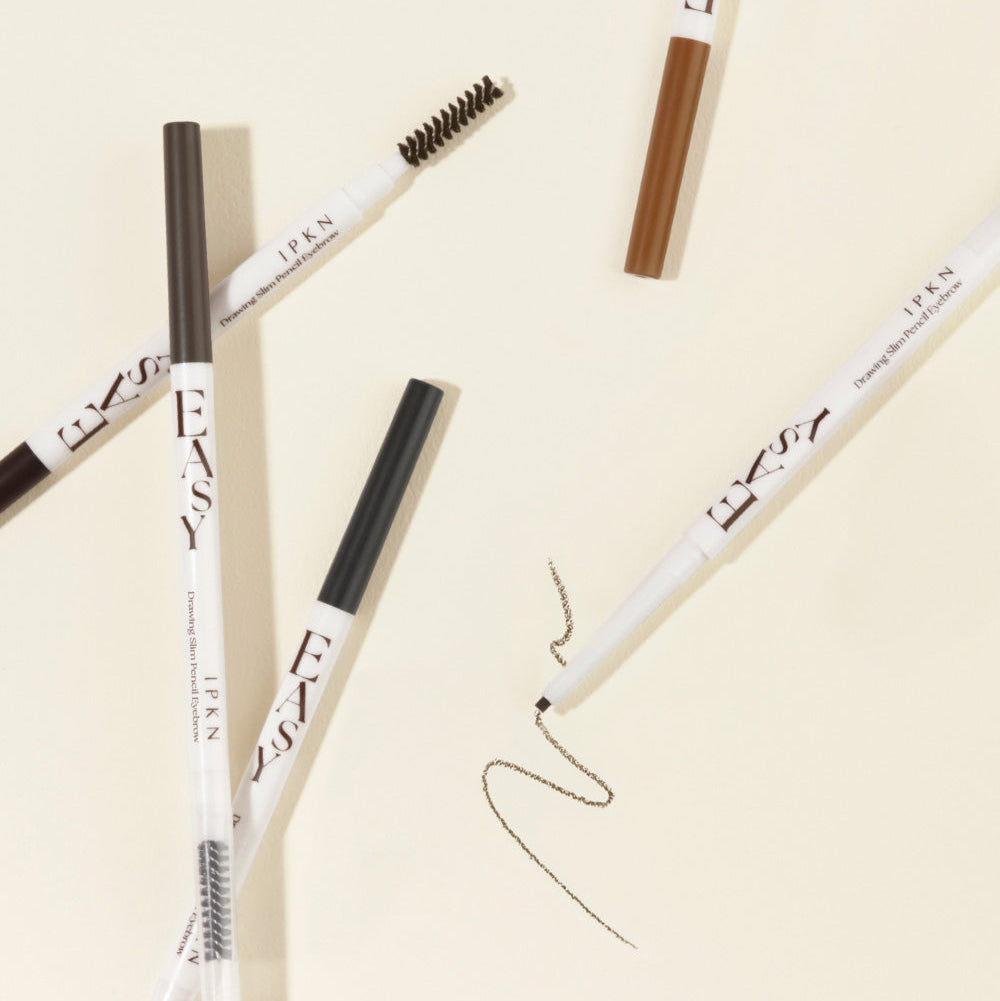 IPKN Easy Drawing Slim Pencil Eyebrow products displayed on a light background with strokes, showcasing different shades and tips.
