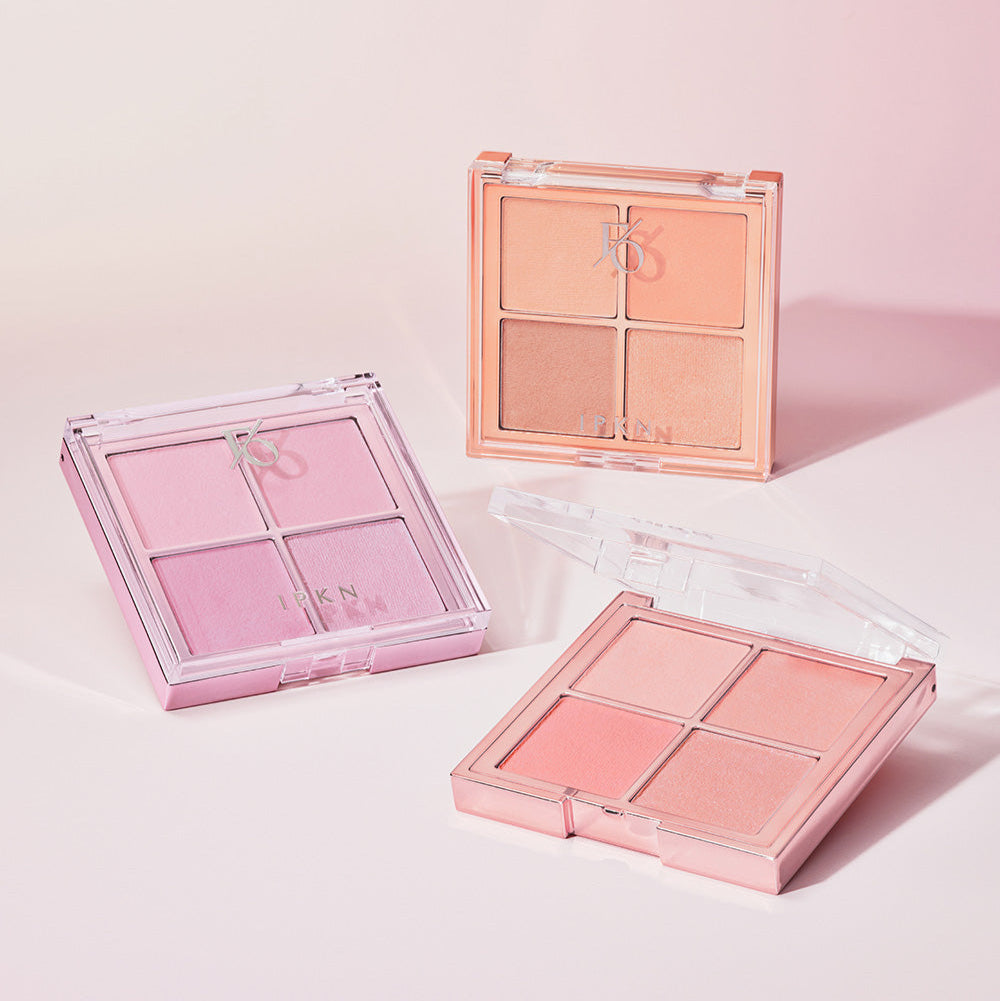 IPKN Flap One Cheek Palette showcasing different shades in sleek packaging on a pink background.