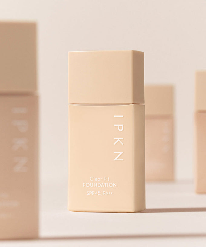 IPKN Clear Fit Foundation SPF45, PA++ 40ml bottle in a minimalist beige design.