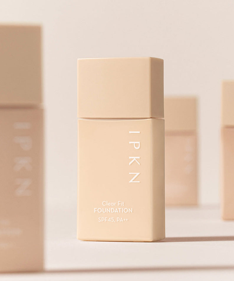 IPKN Clear Fit Foundation SPF45, PA++ 40ml bottle in a minimalist beige design.