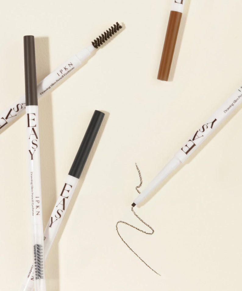 IPKN Easy Drawing Slim Pencil Eyebrow products displayed on a light background with strokes, showcasing different shades and tips.