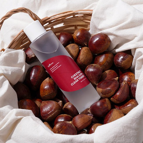 ISNTREE Chestnut BHA 0.9% Toner 200ml bottle surrounded by chestnuts in a basket