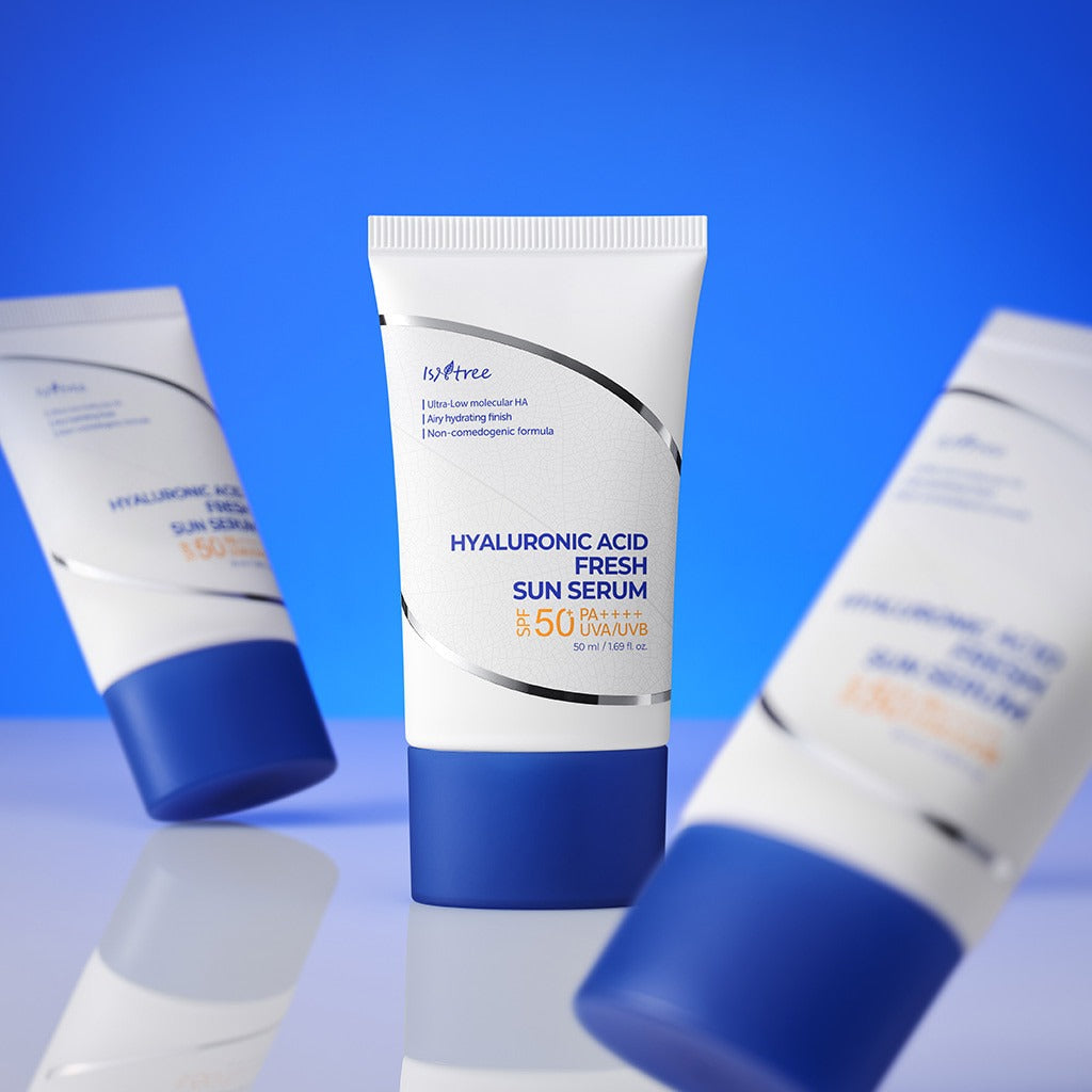 ISNTREE Hyaluronic Acid Fresh Sun Serum 50ml tube on a reflective blue surface