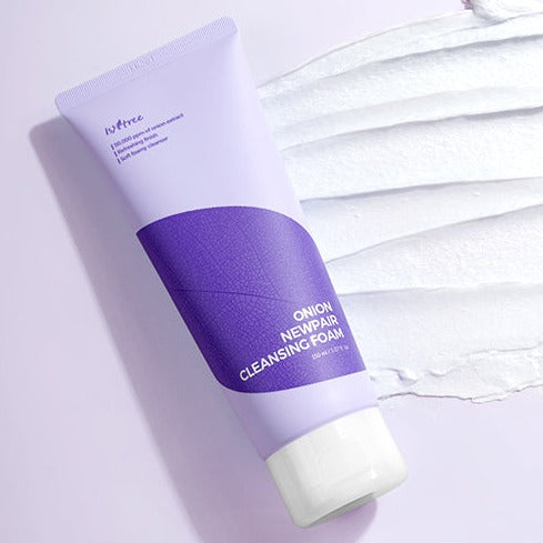 ISNTREE Onion Newpair Cleansing Foam 150ml product image with purple packaging on a textured surface