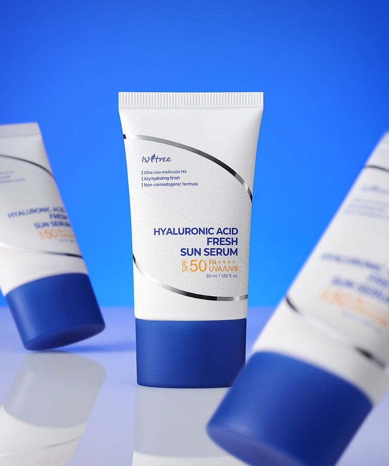 ISNTREE Hyaluronic Acid Fresh Sun Serum 50ml tube on a reflective blue surface