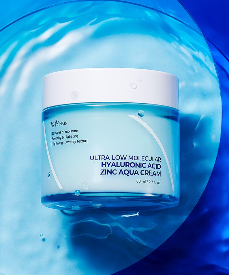 ISNTREE Hyaluronic Acid ZINC Moisture Cream 80ml jar on a blue water background