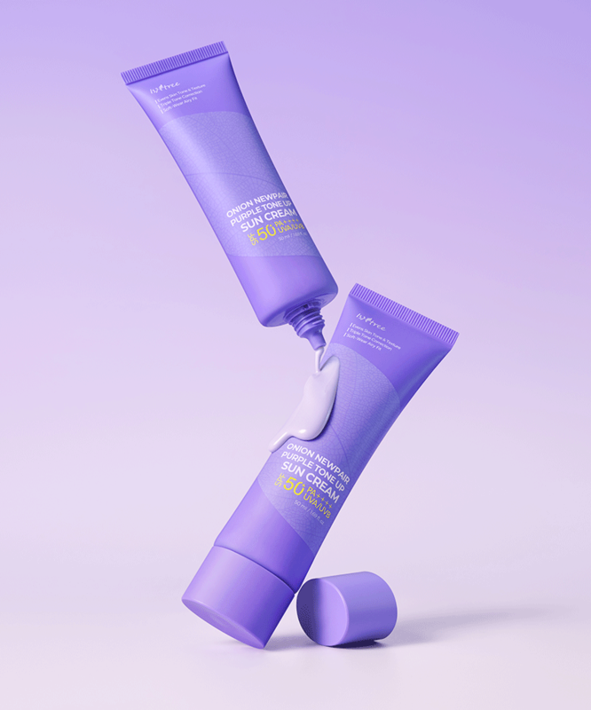 ISNTREE Onion Newpair Purple Tone-Up Sunscreen 50ml displayed on a purple background with two tubes and flowing cream.