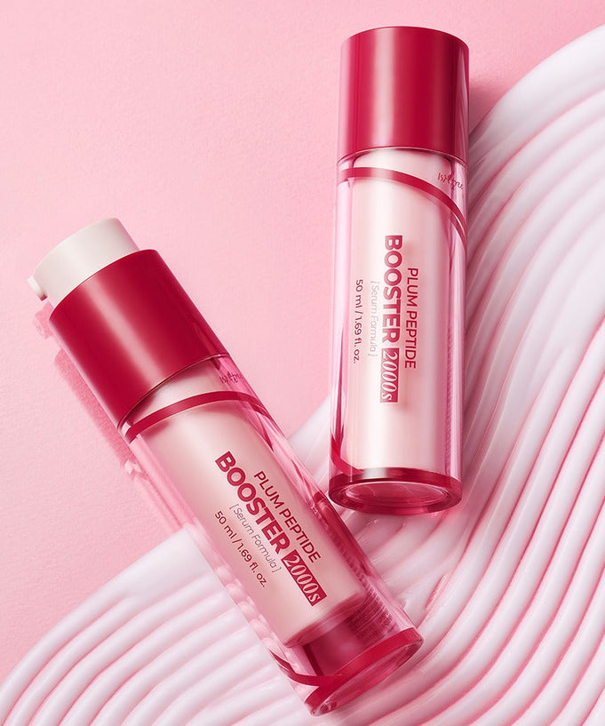 ISNTREE Plum Peptide Booster 2000s 50ml with pink background and elegant packaging design.