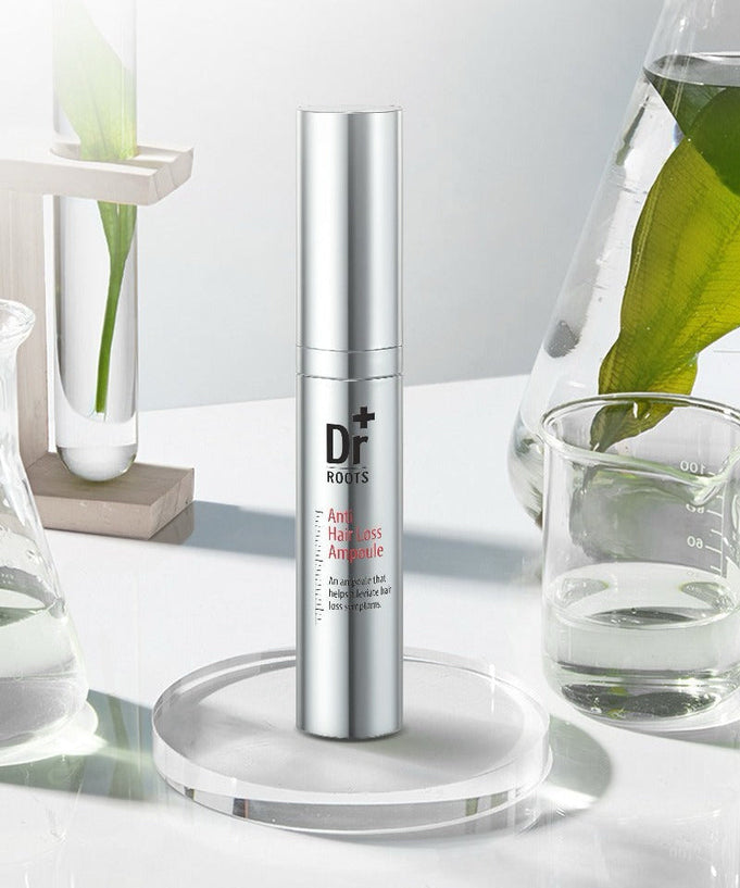 ISOI Dr.Roots Anti-Hair Loss Ampoule 10ml surrounded by glass containers in a lab setting