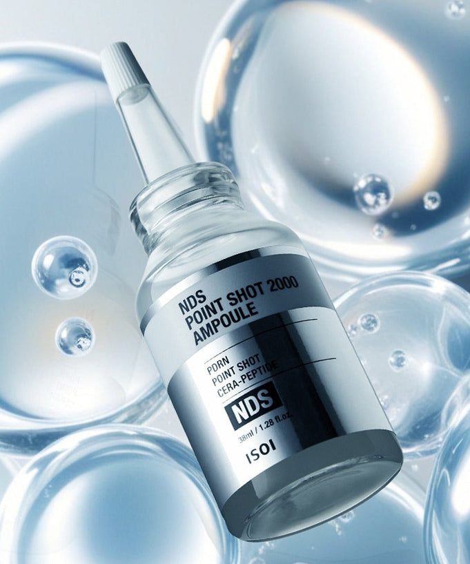 ISOI NDS Point Shot 2000 Ampoule 38ml skincare product bottle with floating bubbles background