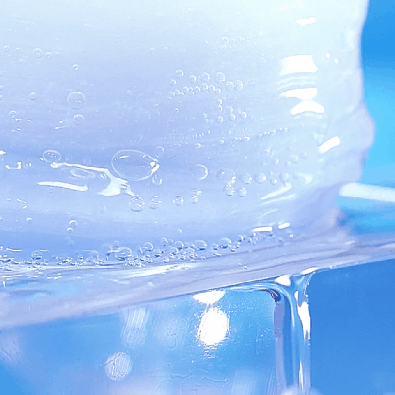 Close-up of IT'S SKIN Power 10 Licorice Julen Jelly Pad 130 Sheets in a jar with visible texture and hydration bubbles.