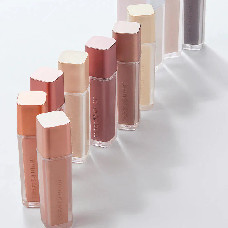 JAVIN DE SEOUL Wink Eye Shimmer Light collection showcasing various shades in elegant packaging.
