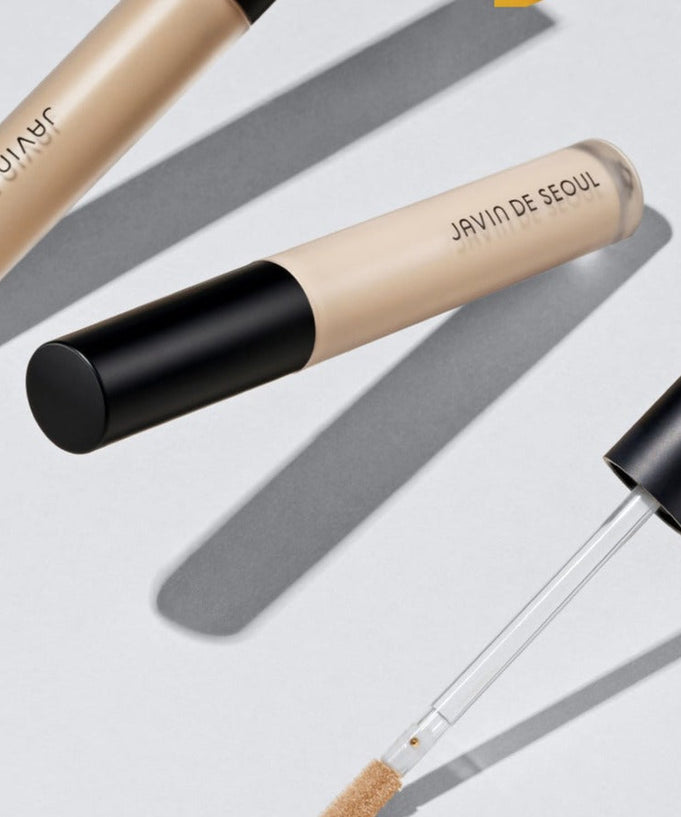JAVIN DE SEOUL Wink Liquid Concealer 6.5g - sleek design with applicator, enhancing makeup routine for flawless complexion.