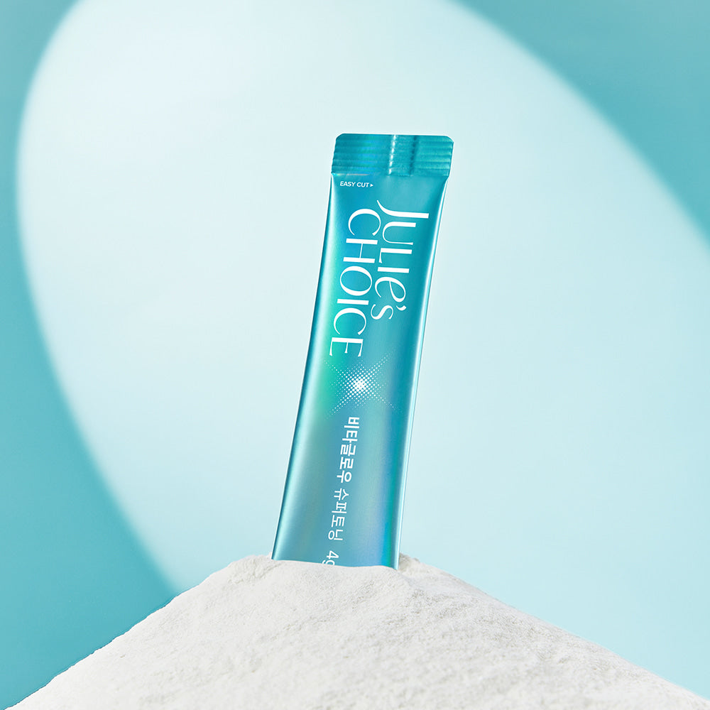 JULIE'S CHOICE Vita Glow Super Toning product packaging displayed on white surface against blue background.
