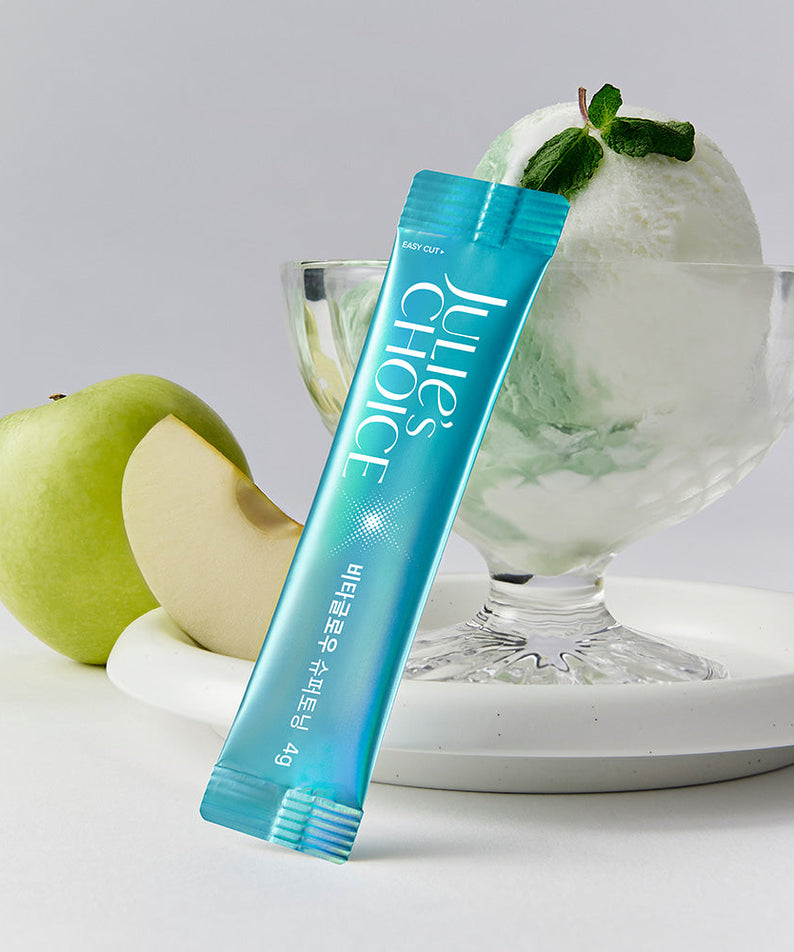 JULIE'S CHOICE Vita Glow Super Toning sachet with a green apple and dessert in background