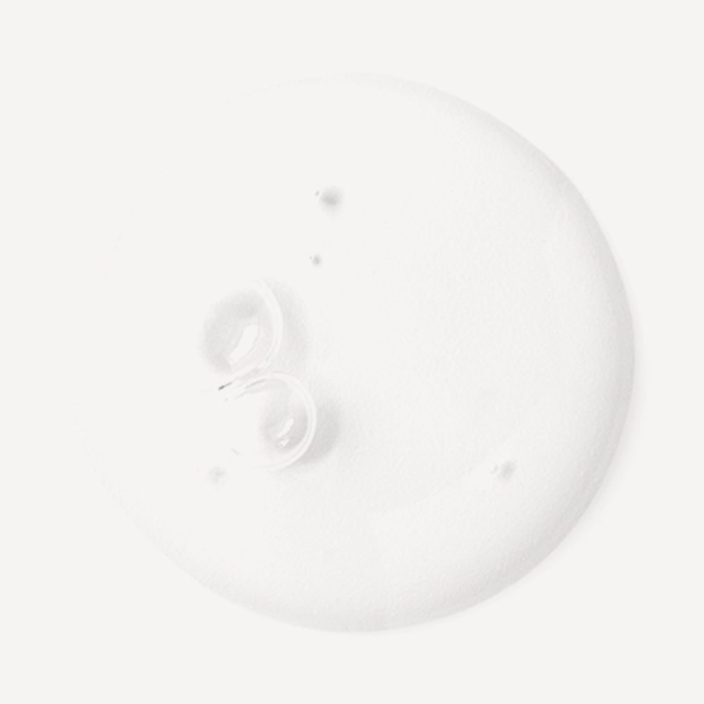 Texture of JULYME Damage Care Collagen Shampoo 500ml (Full Bloom) showcasing smooth and creamy white appearance.