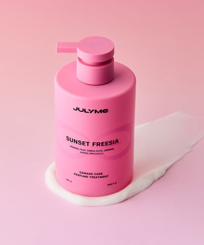 JULYME Damage Care Perfume Hair Treatment 500ml bottle on pink background