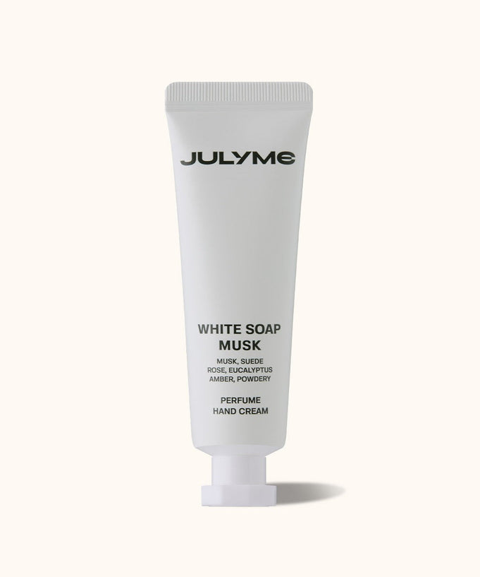 JULYME Perfume Shea Butter Hand Cream 30ml in white tube packaging with text highlighting musk, suede, rose, eucalyptus, amber, and powdery scent.