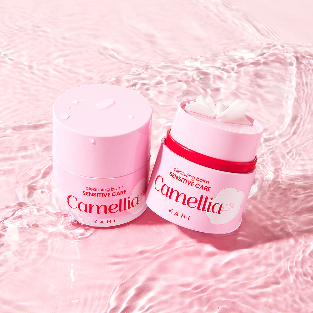KAHI Cleansing Balm Sensitive Care 50ml on textured surface, showcasing skincare product for sensitive skin.